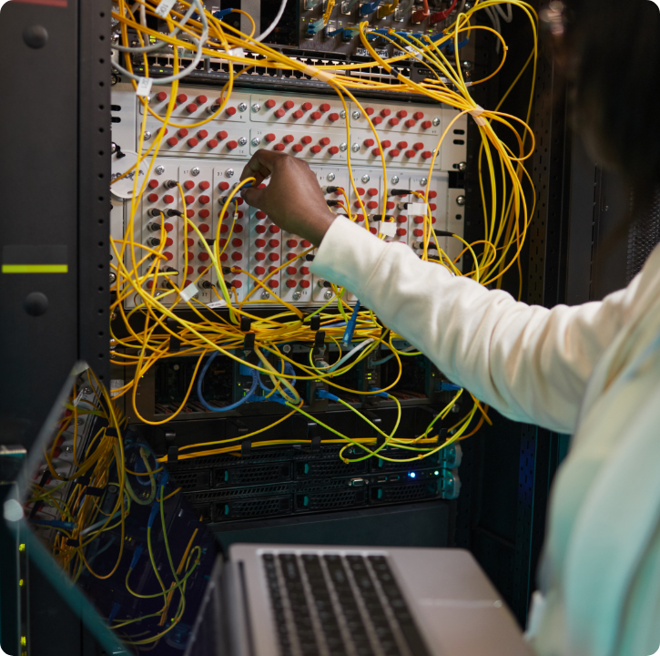 female_network_technician_connecting_cables_close_2025_03_08_21_03_37_utc